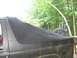 Custom made boat canvas Fastback style soft top, no rear window. Snaps attached to body.